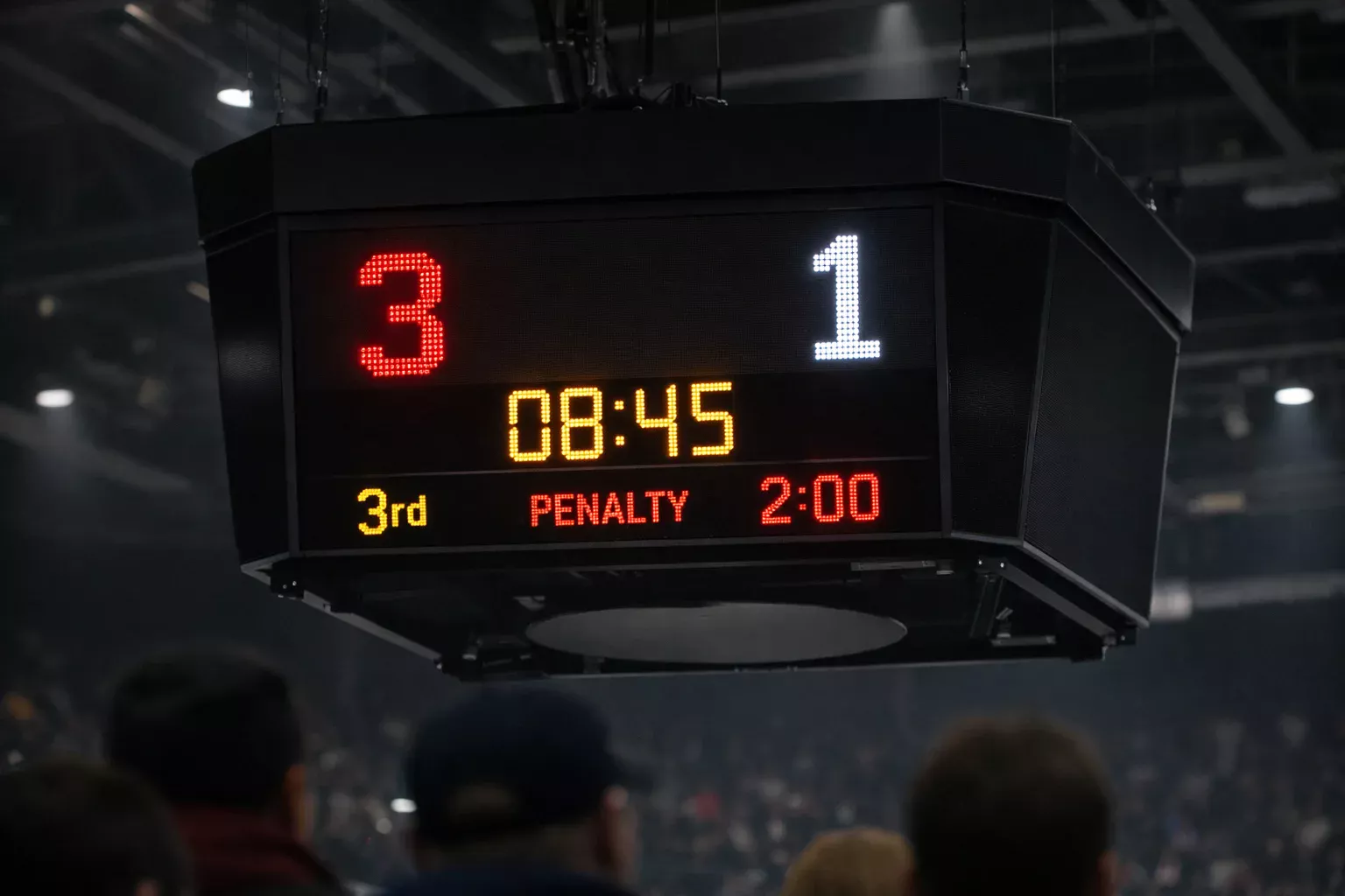 Hockey scoreboard showing a two-goal difference in an NHL game